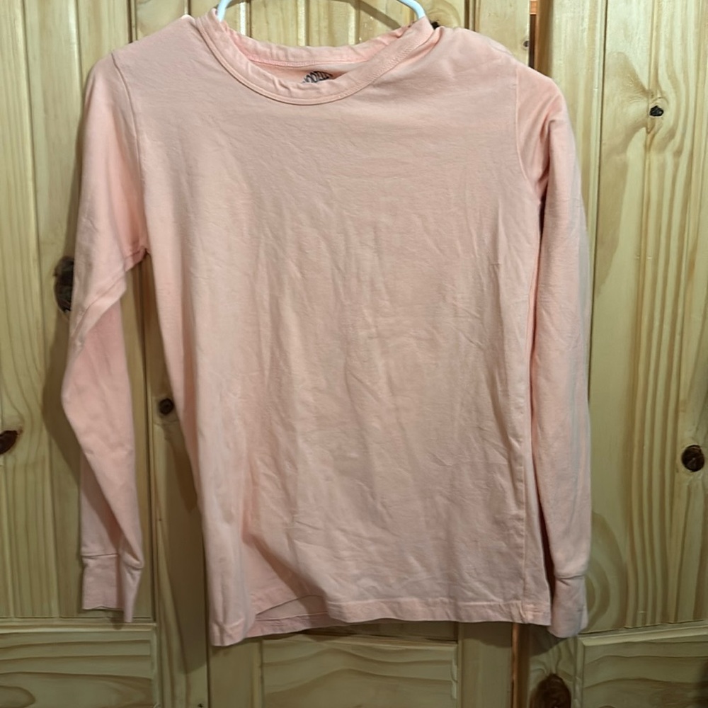 Peach colored shirt